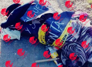 Encuentran una persona ejecutada y encobijada en Valle de Santiago, le dejaron una cartulina con un mensaje alusivo.