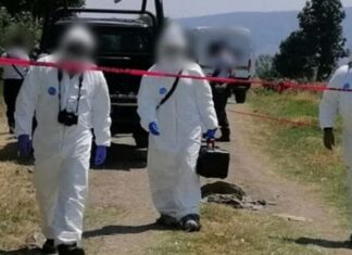 Encuentran un cuerpo baleado y quemado en Cuitzeo Michoacan.
