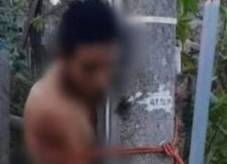 Amarran a un sujeto semidesnudo en un poste, presentaba un balazo en las manos.