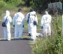 Localizan cuerpo de mujer asesinada a tiros