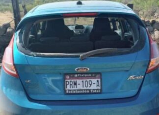 Localizan carro baleado con un menor de edad adentro
