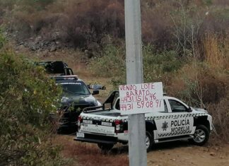 El cadáver de un hombre con el rostro encintado fue tirado en la carretera