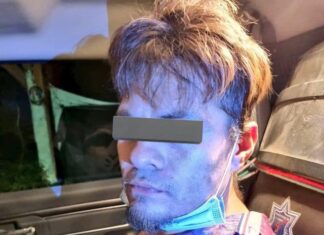 Policía de León detuvo a un sujeto que vandalizo una farmacia e intento incendiarla.